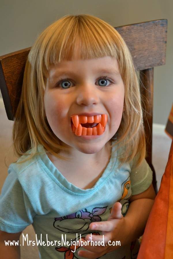 Karina with Vampire Teeth